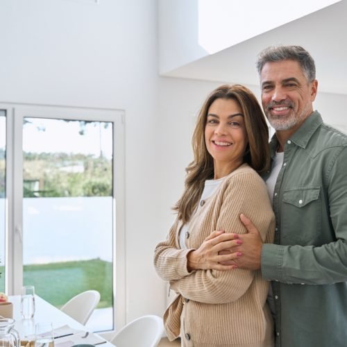 Portrait,Of,Happy,Smiling,Mature,Older,Family,Couple,Real,Estate